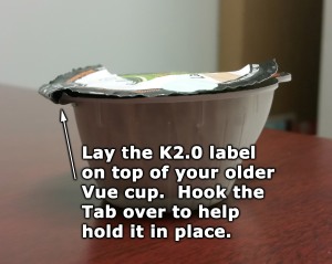 Lay the modified label on your incompatible Vue cup.