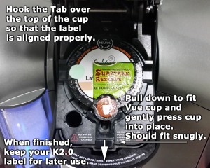 The Vue cup should fit snugly into the chamber.